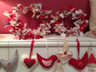 Tree decorations and fabric wreaths in varying sizes